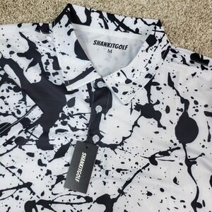 NWT Shank It Golf Mens Medium White Black AOP Paint Splatter Performance Polo SS